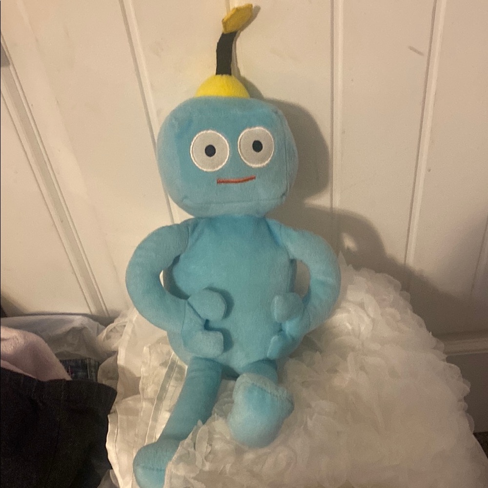 Blue Plush Toy with Yellow Hat robot